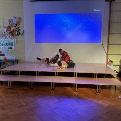 Children rehearsing for their play
